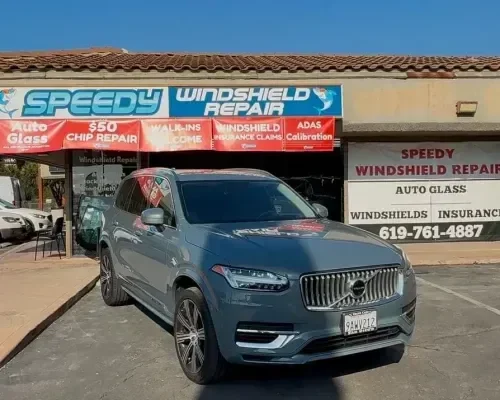 Volvo XC90 in for windshield work, a vehicle with a forward-facing camera behind the glass